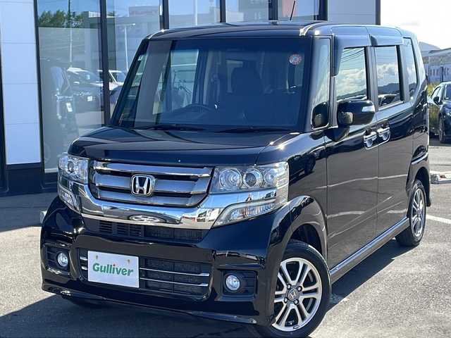 ホンダ Ｎ ＢＯＸ カスタム G Lパッケージ 道東・釧路十勝 2016(平28)年 5.2万km 黒 ・４WD/・純正SDメモリナビ/（CD・DVD・AM・FM・ワンセグ・BT）/・バックカメラ/・純正エンジンスターター/・スマートキー/・プッシュスタート/・HIDヘッドライト/・オートライト/・フォグライト/・ヒーテッドドアミラー/・ビルトインＥＴＣ/・前席シートヒーター/・ステアリングスイッチ/・ドアバイザー/・電動格納ウィンカー
