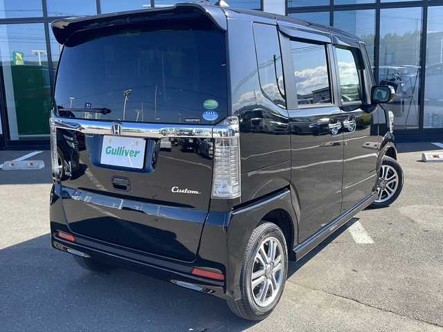 ホンダ Ｎ ＢＯＸ カスタム G Lパッケージ 道東・釧路十勝 2016(平28)年 5.2万km 黒 ・４WD/・純正SDメモリナビ/（CD・DVD・AM・FM・ワンセグ・BT）/・バックカメラ/・純正エンジンスターター/・スマートキー/・プッシュスタート/・HIDヘッドライト/・オートライト/・フォグライト/・ヒーテッドドアミラー/・ビルトインＥＴＣ/・前席シートヒーター/・ステアリングスイッチ/・ドアバイザー/・電動格納ウィンカー