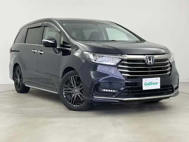 ホンダ オデッセイ ハイブリッド e:HEVアブソルート EX 新潟県 2021(令3)年 6.1万km プレミアムヴィーナスブラックP メーカー純正ナビ/(CD.DVD.SD.フルセグ.Bluetooth)/全方位カメラ/ホンダセンシング/レーダークルーズコントロール/レーンキープアシスト/ブラインドスポットモニター/LEDオートライト/両側パワースライドドア/前後ドライブレコーダー/ハーフレザーシート/前席シートヒーター/ビルトインETC2.0/プッシュスタート/スマートキー/純正フロアマット