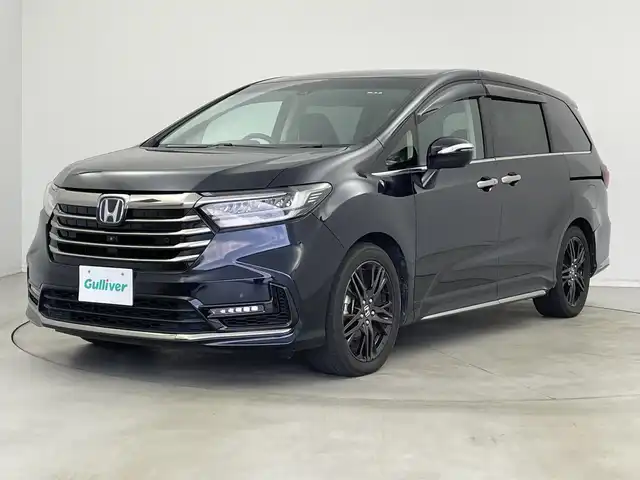 ホンダ オデッセイ ハイブリッド e:HEVアブソルート EX 新潟県 2021(令3)年 6.1万km プレミアムヴィーナスブラックP メーカー純正ナビ/(CD.DVD.SD.フルセグ.Bluetooth)/全方位カメラ/ホンダセンシング/レーダークルーズコントロール/レーンキープアシスト/ブラインドスポットモニター/LEDオートライト/両側パワースライドドア/前後ドライブレコーダー/ハーフレザーシート/前席シートヒーター/ビルトインETC2.0/プッシュスタート/スマートキー/純正フロアマット