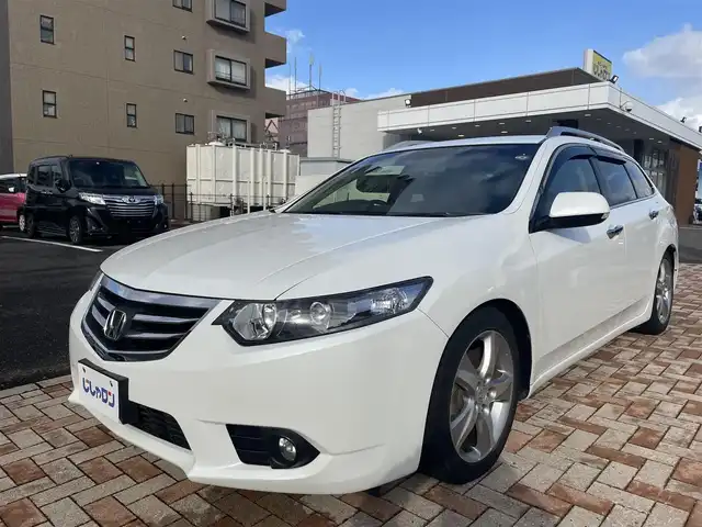ホンダ アコード ツアラー 20TL インターナビパッケージ 新潟県 2012(平24)年 7.8万km ホワイトオーキッドパール (株)IDOMが運営する【じしゃロン新潟店】の自社ローン専用車両になります。/こちらは現金またはオートローンご利用時の価格です。自社ローンご希望の方は別途その旨お申付け下さい/スマートキー/スペアキー１本付/クルーズコントロール/純正ナビ/ワンセグテレビ（走行時視聴不可）/CD、DVD、AM、FM視聴可能/バックカメラ/ETC/純正フロアマット/純正AW/本革巻きステアリング/ウインカーミラー/キセノンヘッドランプ