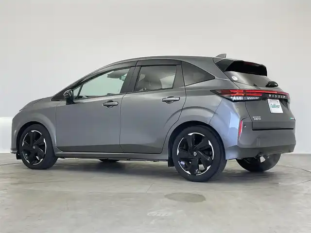 日産 オーラ G  90周年記念車 埼玉県 2024(令6)年 1.3万km ダークメタルグレー プロパイロット　ＢＯＳＥ　純正９インチナビ　アラウンドビューモニター　ＢＳＭ　ビルトインＥＴＣ２．０　ドライブレコーダー　レーダークルーズ　インテリジェントルームミラー　オートハイビーム　ＬＥＤ　ＴＶ