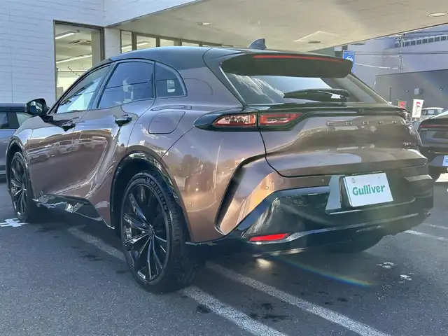 トヨタ クラウン スポーツ Z 長崎県 2024(令6)年 1.5万km ゴールドⅡ ワンオーナー/純正ディスプレイオーディオ（AM/FM/BT/フルセグTV/ミラキャスト)/プッシュスタート/ハンドルヒーター/ブレーキホールド/Cタイプ電源（フロント×２　リア×２）/ガラスルーフ/ビルトインETC2.0/ステアリングスイッチ/レザーシート/シートヒーター（D/N)/エアシート（D/N)/スマートフォン非接触充電/パワーバックドア/デジタルインナーミラー/パーキングアシスト/レーンキープアシスト/クルーズコントロール（追従あり）/オートライト/オートハイビーム/AC100V/パワーシート（D/N・メモリー）/電子サイドブレーキ