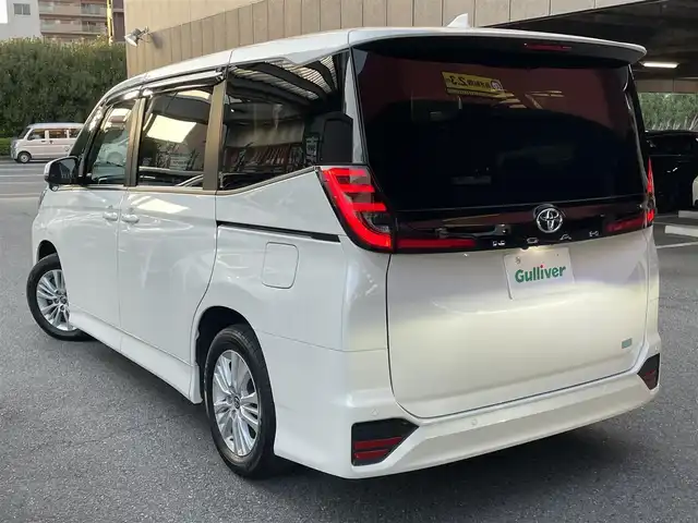 トヨタ ノア S－G 佐賀県 2023(令5)年 1.3万km ホワイトパールクリスタルシャイン ワンオーナー/トヨタセーフティセンス/・衝突被害軽減ブレーキ/・車線逸脱防止アラート/・先行車追随クルーズコントロール/・オートハイビーム/純正１０.５インチメモリナビ/・Bluetoothオーディオ/・Wifi/カーマルチメディア/・HDMI端子/・フルセグテレビ/ETC2.0/両側パワースライドドア/レザーステアリング/リアクーラー/ヘッドライトレベライザー/プッシュスタート