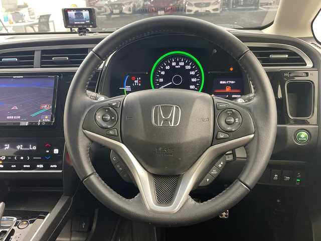 ホンダ シャトル ハイブリッド X ホンダセンシング 岐阜県 2018(平30)年 10万km ミッドナイトブルービームM ホンダセンシング/社外8インチナビ/（CD/DVD/Bluetooth/SD）/バックカメラ/レーダークルコン/前方ドライブレコーダー/前席シートヒーター/ハーフレザーシート/パドルシフト/ステアリングスイッチ/フォグランプ/オートLEDヘッドライト/プッシュスタート/スマートキー/ビルトインETC