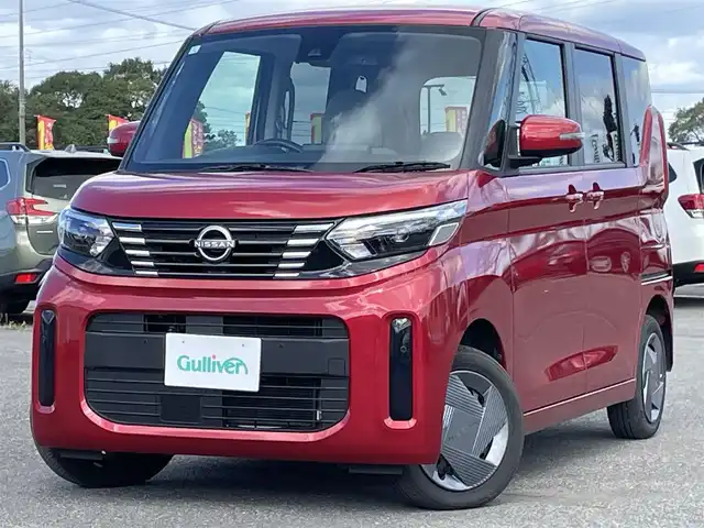 日産 ルークス X ターボ 道央・札幌 2024(令6)年 0.7万km スパークリングレッドM ４WD/純正ディーラーOPナビ/CD/SD/BT/フルセグ/エマージェンシーブレーキ/横滑り防止装置/レーンキープアシスト/クリアランスソナー/アラウンドビューモニター/アイドリングストップ/両側パワースライドドア/前席シートヒーター/ステアリングリモコン/ハンドルヒーター/プッシュスタート/スマートキー/LEDヘッドライト/オートライト/オートハイビーム/ヘッドライトレベライザー/電動格納ミラー/純正フロアマット/スペアキー