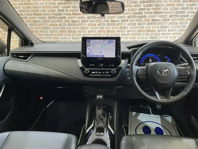 トヨタ カローラツーリング ハイブリッド ダブルバイビー 岩手県 2021(令3)年 8.8万km ホワイトパールクリスタルシャイン ４WD/ヘッドアップディスプレイ/トヨタセーフティセンス/プリクラッシュセーフティ/レーダークルーズコントロール/レーントレーシングアシスト/オートマチックハイビーム/ブラインドスポットモニター/リヤクロストラフィックアラート/クリアランスソナー/横滑り防止装置/オートブレーキホールド/前席シートヒーター/ステアリングヒーター/AC100V1500Wアクセサリーコンセント/純正ディスプレイオーディオ/ナビゲーション機能/フルセグTV/CD・DVDデッキ/バックカメラ/ETC2.0/ドライブレコーダー/LEDヘッドランプ/純正１７インチアルミホイール