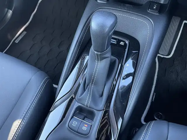 トヨタ カローラツーリング ハイブリッド ダブルバイビー 鳥取県 2022(令4)年 1.6万km スパークリングブラックパールクリスタルシャイン ４WD/純正ナビ/フルセグ/BT/USB/バックカメラ/ETC2.0/前後ドライブレコーダー/ハーフレザーシート/前席シートヒーター/ステアリングヒーター/モデリスタエアロ/フロント/リア/サイド/レーダークルーズコントロール/レーンキープアシスト/デジタルインナーミラー/LEDヘットライト/純正17インチアルミホイール/プッシュエンジンスタート/フロアマット/ドアバイザー/取扱説明書/スペアキー