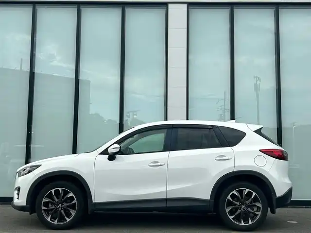 マツダ ＣＸ－５ XD Lパッケージ 大阪府 2016(平28)年 19万km クリスタルホワイトパールマイカ 純正ナビ/   CD/DVD/Bluetooth/USB/バックサイドモニター（左サイド）/衝突軽減ブレーキ/横滑り防止装置/コーナーセンサー　/ＢＳＭ/前席シートヒーター/前席パワーシート（運転席のみメモリー付き）/レーダークルーズコントロール/レーンキープアシスト/パドルシフト/アイドリングストップ/前後ドライブレコーダー/オートマチックハイビーム/純正19インチアルミホイール/プッシュスタート/スマートキー/ＥＴＣ/ＬＥＤ/禁煙車