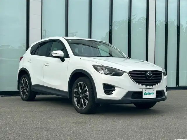 マツダ ＣＸ－５ XD Lパッケージ 大阪府 2016(平28)年 19万km クリスタルホワイトパールマイカ 純正ナビ/   CD/DVD/Bluetooth/USB/バックサイドモニター（左サイド）/衝突軽減ブレーキ/横滑り防止装置/コーナーセンサー　/ＢＳＭ/前席シートヒーター/前席パワーシート（運転席のみメモリー付き）/レーダークルーズコントロール/レーンキープアシスト/パドルシフト/アイドリングストップ/前後ドライブレコーダー/オートマチックハイビーム/純正19インチアルミホイール/プッシュスタート/スマートキー/ＥＴＣ/ＬＥＤ/禁煙車