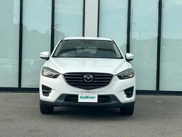 マツダ ＣＸ－５ XD Lパッケージ 大阪府 2016(平28)年 19万km クリスタルホワイトパールマイカ 純正ナビ/   CD/DVD/Bluetooth/USB/バックサイドモニター（左サイド）/衝突軽減ブレーキ/横滑り防止装置/コーナーセンサー　/ＢＳＭ/前席シートヒーター/前席パワーシート（運転席のみメモリー付き）/レーダークルーズコントロール/レーンキープアシスト/パドルシフト/アイドリングストップ/前後ドライブレコーダー/オートマチックハイビーム/純正19インチアルミホイール/プッシュスタート/スマートキー/ＥＴＣ/ＬＥＤ/禁煙車