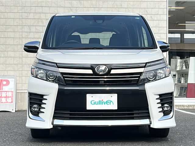 トヨタ ヴォクシー ZS 煌Ⅱ 千葉県 2016(平28)年 9万km ホワイトパールクリスタルシャイン ワンオーナー/純正9型SDナビ【NSZT-Y66T】/フルセグTV/DVD/CD/Bluetooth/12型フリップダウンモニター/バックカメラ/ETC/衝突軽減ブレーキ/レーンキープアシスト/LEDヘッドライト/純正16インチアルミホイール/スマートキー/LEDヘッドライト/オートライト/ステアリングスイッチ/ドアバイザー/社外フロアマット/スペアキー/保証書/取扱説明書