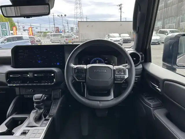トヨタ ランドクルーザー ２５０ VX 愛知県 2024(令6)年 2.3万km アバンギャルドブロンズメタリック ワンオーナー/純正メモリナビ/フルセグテレビ/バックカメラ/アラウンドビュー/Bluetooth/ウィンカーミラー/クルーズコントロール/プッシュスタート/ビルトインETC2.0/パワーバックドア/デジタルインナーミラー/衝突軽減ブレーキ/BSM