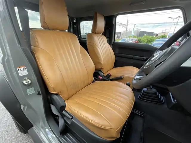 スズキ ジムニー シエラ JC 滋賀県 2024(令6)年 0.6万km ミディアムグレー クルーズコントロール/ETC/ステアリングスイッチ/シートヒーター/LEDヘッドライト/オートライト/オートハイビーム/純正フロアマット/純正15インチアルミホイール/プッシュスタート/スマートキー/スペアキー