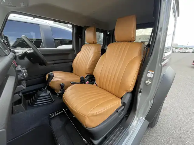 スズキ ジムニー シエラ JC 滋賀県 2024(令6)年 0.6万km ミディアムグレー クルーズコントロール/ETC/ステアリングスイッチ/シートヒーター/LEDヘッドライト/オートライト/オートハイビーム/純正フロアマット/純正15インチアルミホイール/プッシュスタート/スマートキー/スペアキー