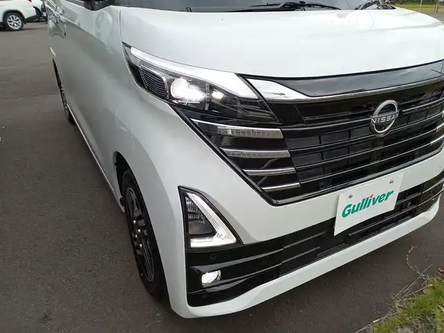 日産 ルークス HWS X プロパイロットED 福井県 2024(令6)年 0.6万km ホワイトパール 純正ディーラーオプションナビ（MJ116D-W）/・（フルセグTV/CD/DVD/Bluetooth/AUX/FM/AM）/プロパイロット/エマージェンシーブレーキ/車線逸脱警報/デジタルインナーミラー/インテリジェントアラウンドビューモニター/両側パワースライドドア/アイドリングストップ/前席シートヒーター/ステアリングヒーター/電動パーキング/オートブレーキホールド/オートLEDライト/フロントフォグランプ/純正14インチAW/純正フロアマット/スマートキー