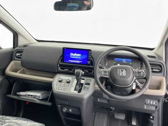 ホンダ フリード ハイブリット e:HEV AIR EX 長野県 2025(令7)年 0.1千km クリスタルブラックパール 登録済未使用車/純正9インチナビ/（フルセグ/Bluetooth/AppleCarPlay/AndroidAuto)/バックカメラ/ホンダセンシング/・衝突軽減ブレーキ/・レーンキープアシスト/・レーダークルーズコントロール/・ブラインドスポットモニター/・踏み間違い防止/・前後コーナーセンサー/両側電動スライドドア/電子パーキング/リア席サンシェード/LEDヘッドライト/オートライト/ウィンカーミラー/ハーフレザーシート/取扱説明書/保証書/スマートキー/スペアキー