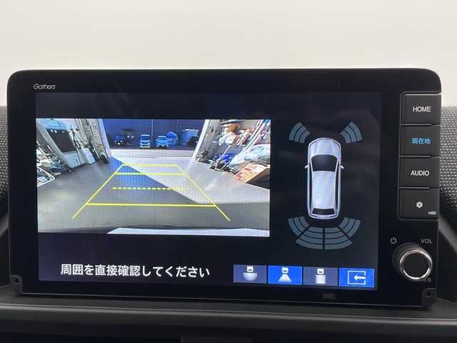 ホンダ フリード ハイブリット e:HEV AIR EX 長野県 2025(令7)年 0.1千km クリスタルブラックパール 登録済未使用車/純正9インチナビ/（フルセグ/Bluetooth/AppleCarPlay/AndroidAuto)/バックカメラ/ホンダセンシング/・衝突軽減ブレーキ/・レーンキープアシスト/・レーダークルーズコントロール/・ブラインドスポットモニター/・踏み間違い防止/・前後コーナーセンサー/両側電動スライドドア/電子パーキング/リア席サンシェード/LEDヘッドライト/オートライト/ウィンカーミラー/ハーフレザーシート/取扱説明書/保証書/スマートキー/スペアキー