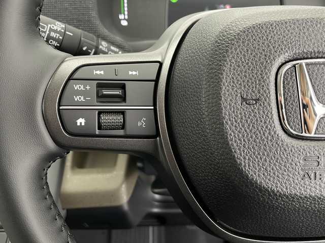 ホンダ フリード ハイブリット e:HEV AIR EX 長野県 2025(令7)年 0.1千km クリスタルブラックパール 登録済未使用車/純正9インチナビ/（フルセグ/Bluetooth/AppleCarPlay/AndroidAuto)/バックカメラ/ホンダセンシング/・衝突軽減ブレーキ/・レーンキープアシスト/・レーダークルーズコントロール/・ブラインドスポットモニター/・踏み間違い防止/・前後コーナーセンサー/両側電動スライドドア/電子パーキング/リア席サンシェード/LEDヘッドライト/オートライト/ウィンカーミラー/ハーフレザーシート/取扱説明書/保証書/スマートキー/スペアキー