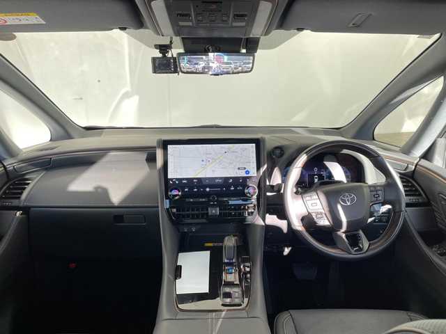 トヨタ アルファードハイブリット Z 群馬県 2025(令7)年 0.7万km ブラック サンルーフ　純正１４型ナビ　純正１３．２型後席モニター　電子ミラー　ユニバーサルステップ　ワイヤレス充電器　全周囲カメラ　ドラレコ　両側電動スライドドア　シートヒーター／シートベンチレーション　禁煙車