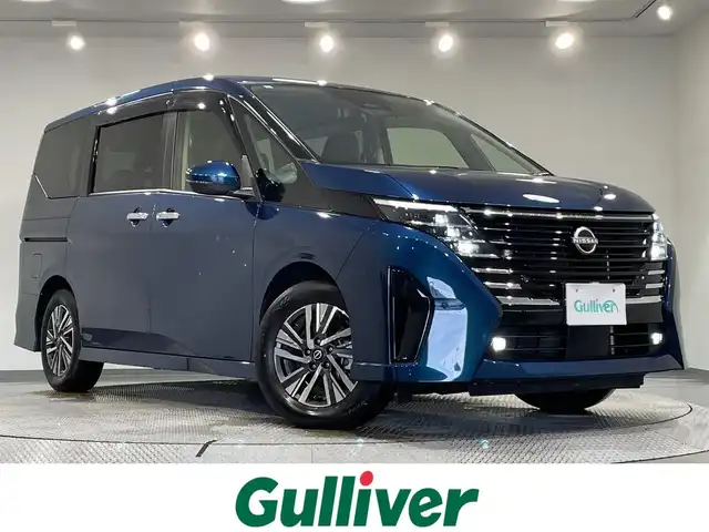 日産 セレナ ハイウェイスター V 愛知県 2023(令5)年 3.2万km ミディアムブルーメタリック 純正１２．３インチナビ　/(Bluetooth/フルセグTV/CarPlay/USB/AM/FM)/純正フリップダウンモニター　/両側パワースライドドア　/アラウンドビューモニター　/プロパイロット　/ビルトインＥＴＣ２．０　/ワイヤレス充電　/デジタルインナーミラー　/シートヒーター/ステアリングヒーター/衝突軽減ブレーキ/ブラインドスポットモニター/LEDヘッドライト/オートブレーキホールド機能/純正フロアマット/ソナー/パドルシフト