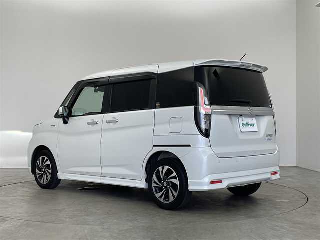 スズキ ソリオ バンディット HV MV 埼玉県 2024(令6)年 0.7万km ピュアホワイトP 純正メモリナビ/ CD DVD フルセグTV Bluetooth/全周囲カメラ/スズキセーフティサポート/衝突軽減ブレーキ/レーダークルーズコントロール/誤発進抑制制御機能/両側電動スライドドア/オートハイビーム/LEDヘッドライト/パドルシフト/ステアリングスイッチ/スマートキー×２/前席シートヒーター/ドライブレコーダー/ETC/15インチ純正アルミホイール/電動格納ミラー/アイドリングストップ/プッシュスタート/純正フロアマット