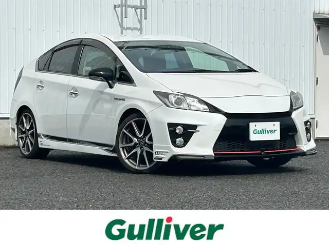 トヨタ プリウス S ツーリングセレ G’s 熊本県 2013(平25)年 8.3万km ホワイトパールクリスタルシャイン 純正ナビ/・AM/FM/CD/DVD/USB/BT/・フルセグTV/バックカメラ/・サイド/レーンキープアシスト/横滑り防止装置/革巻きステアリング/・ステアリングリモコン/電動格納ミラー/・ウィンカーミラー/D/N席シートヒーター/純正エアロパーツ/・フロント/リアアンダー/ビルトインETC/HIDライト/・フォグランプ/トノカバー/純正ドアバイザー/純正フロアマット/純正アルミホイール/スマートキー/PWRモード/ECOモード/EVモード