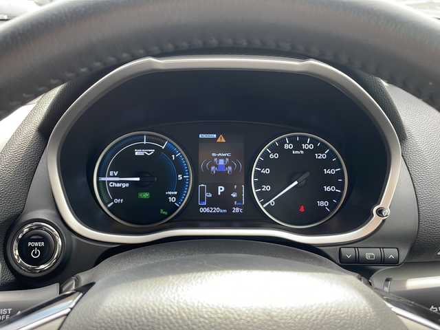 三菱 エクリプス クロス ＰＨＥＶ P 富山県 2022(令4)年 0.7万km ホワイトダイヤモンド 4WD/社外HDDナビ（CN-F1X10HD）/フルセグ/バックカメラ/ETC/ヘッドアップディスプレイ/衝突被害軽減ブレーキ/レーンキープアシスト/レーダークルーズコントロール/ブラインドスポットモニター/コーナーセンサー/パドルシフト/AC100V/1500W/ハーフレザーシート/運転席パワーシート/シートヒーター