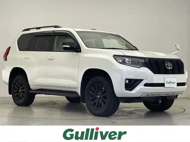 トヨタ ランドクルーザー プラド TX Lパッケージ マットブラED 滋賀県 2023(令5)年 0.6万km ホワイトパールクリスタルシャイン 禁煙車/純正７インチナビ/(SD/DVD/Bluetooth)/フルセグTV/レーダークルーズコントロール/ビルトインETC/コーナーセンサー/オートリトラミラー/シートヒーター/シートベンチレーション/サンルーフ/電動格納サードシート/自動防眩ミラー/プッシュスタート