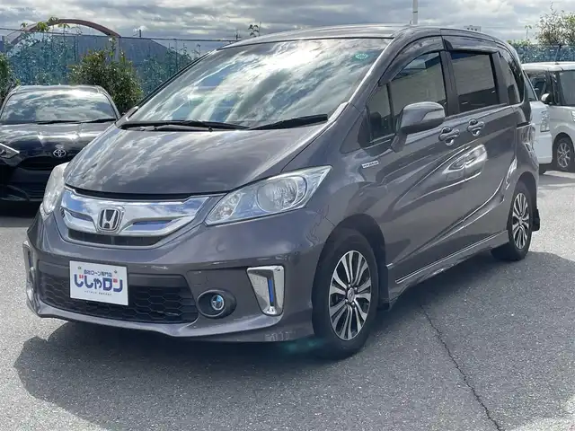 ホンダ フリード ハイブリット ジャストセレクション 東京都 2014(平26)年 8.2万km モダンスティールM (株)IDOMが運営する【じしゃロン昭島店】の自社ローン専用車両になります。こちらは現金またはオートローンご利用時の価格です。自社ローンご希望の方は別途その旨お申付け下さい/純正インターナビ/BT/フルセグ/DVD/CD/バックカメラ/前後ドライブレコーダー/ハーフレザーシート/両側パワースライドドア/ステアリングスイッチ/LEDライト/アルミ純正/フロアマット純正/チップアップシート