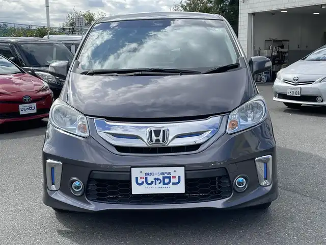 ホンダ フリード ハイブリット ジャストセレクション 東京都 2014(平26)年 8.2万km モダンスティールM (株)IDOMが運営する【じしゃロン昭島店】の自社ローン専用車両になります。こちらは現金またはオートローンご利用時の価格です。自社ローンご希望の方は別途その旨お申付け下さい/純正インターナビ/BT/フルセグ/DVD/CD/バックカメラ/前後ドライブレコーダー/ハーフレザーシート/両側パワースライドドア/ステアリングスイッチ/LEDライト/アルミ純正/フロアマット純正/チップアップシート