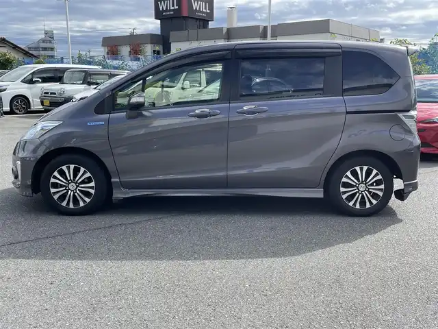 ホンダ フリード ハイブリット ジャストセレクション 東京都 2014(平26)年 8.2万km モダンスティールM (株)IDOMが運営する【じしゃロン昭島店】の自社ローン専用車両になります。こちらは現金またはオートローンご利用時の価格です。自社ローンご希望の方は別途その旨お申付け下さい/純正インターナビ/BT/フルセグ/DVD/CD/バックカメラ/前後ドライブレコーダー/ハーフレザーシート/両側パワースライドドア/ステアリングスイッチ/LEDライト/アルミ純正/フロアマット純正/チップアップシート