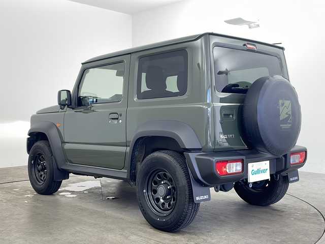 スズキ ジムニー シエラ JL 兵庫県 2022(令4)年 1.5万km ジャングルグリーン ・社外メモリーナビ（KXM-E507W）/　CD/DVD再生/　SDミュージックサーバー/　Bluetoothオーディオ/　フルセグテレビ/・バックカメラ/・ビルドインETC/・衝突被害軽減システム/・純正フロアマット/・シートヒーター（運転席・助手席）/・背面タイヤ/・純正15インチアルミホイール/・ABS/・横滑り防止機能/・盗難防止装置/・オートライト/・オートマチックハイビーム/・ダウンヒルアシストコントロール/・W＋サイドエアバック/・カーテンエアバック/・パートタイム４WD/・スマートキー/・スペアキー/・AACエアコン