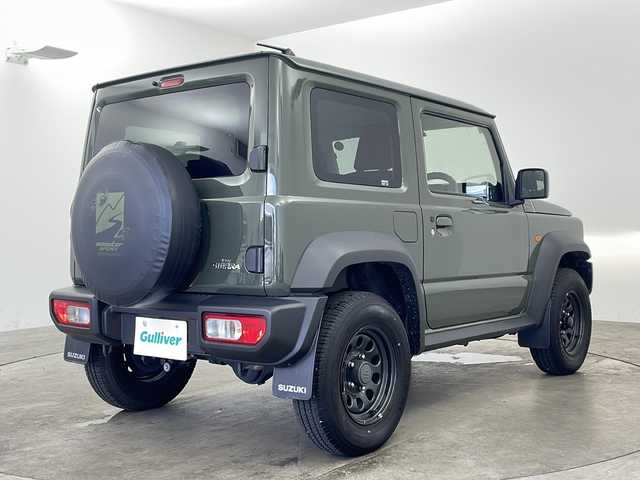 スズキ ジムニー シエラ JL 兵庫県 2022(令4)年 1.5万km ジャングルグリーン ・社外メモリーナビ（KXM-E507W）/　CD/DVD再生/　SDミュージックサーバー/　Bluetoothオーディオ/　フルセグテレビ/・バックカメラ/・ビルドインETC/・衝突被害軽減システム/・純正フロアマット/・シートヒーター（運転席・助手席）/・背面タイヤ/・純正15インチアルミホイール/・ABS/・横滑り防止機能/・盗難防止装置/・オートライト/・オートマチックハイビーム/・ダウンヒルアシストコントロール/・W＋サイドエアバック/・カーテンエアバック/・パートタイム４WD/・スマートキー/・スペアキー/・AACエアコン