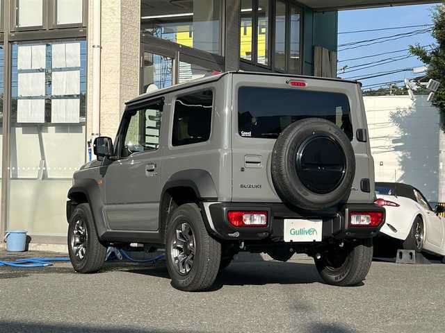 スズキ ジムニー シエラ JC 宮城県 2025(令7)年 0.1万km ミディアムグレー ワンオーナー/４WD/社外ナビ（DVD/CD/AM/FM/SD/USB/BT）/フルセグTV/バックカメラ/クルーズコントロール/レーンキープアシスト/衝突被害軽減装置/ヒルディセントコントロール/ヒーテッドドアミラー/ヘッドライトウォッシャー/シートヒーター（前席）/オートライト/LEDライト/ドライブレコーダー（前後）/サマータイヤ純正AW(195/80R15)/保証書
