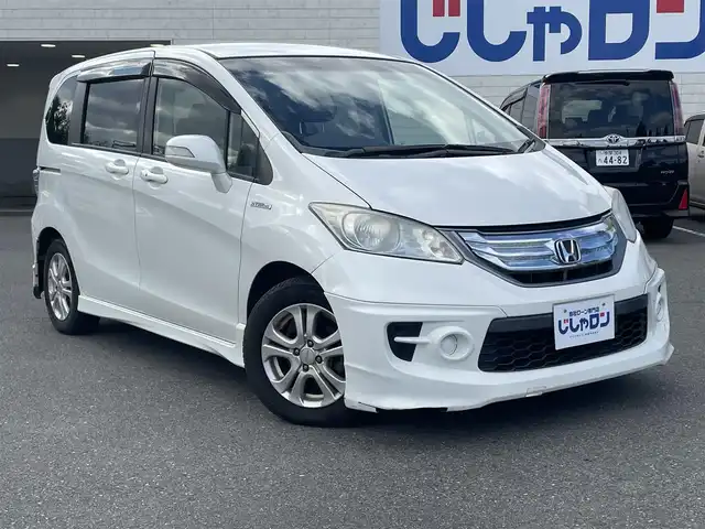 ホンダ フリード ハイブリット ジャストセレクション 東京都 2013(平25)年 6.5万km ホワイトオーキッドパール (株)IDOMが運営する【じしゃロン昭島店】の自社ローン専用車両になります。こちらは現金またはオートローンご利用時の価格です。自社ローンご希望の方は別途その旨お申付け下さい/インター純正ナビ/BT/DVD/CD/ワンセグTV/バックカメラ/フリップダウンモニター/電動格納ミラー/ドアバイザー/ビルトインETC/両側パワースライドドア/MUGENフロアマット