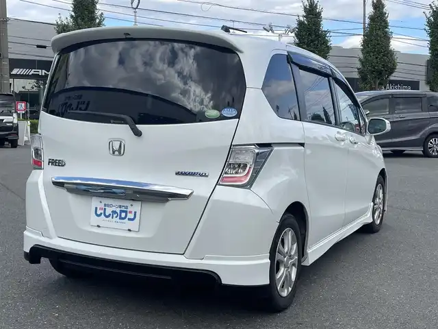 ホンダ フリード ハイブリット ジャストセレクション 東京都 2013(平25)年 6.5万km ホワイトオーキッドパール (株)IDOMが運営する【じしゃロン昭島店】の自社ローン専用車両になります。こちらは現金またはオートローンご利用時の価格です。自社ローンご希望の方は別途その旨お申付け下さい/インター純正ナビ/BT/DVD/CD/ワンセグTV/バックカメラ/フリップダウンモニター/電動格納ミラー/ドアバイザー/ビルトインETC/両側パワースライドドア/MUGENフロアマット