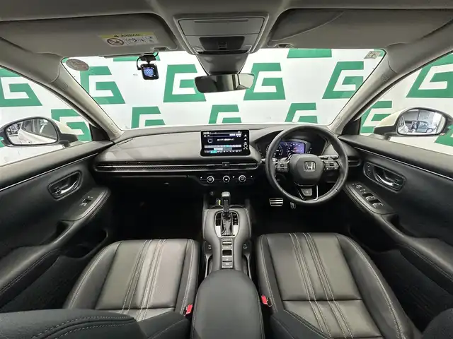 ホンダ ＺＲ－Ｖ Z 鹿児島県 2024(令6)年 2.1万km プラチナホワイトパール 禁煙車/純正9インチナビ(フルセグTV/Bluetooth)/全方位カメラ/ホンダセンシング/追従型クルーズコントロール/BOSEプレミアムサウンド/ブラインドスポットインフォメーション/後退出庫サポート/アダプティブドライビングビーム/運転席メモリー機能付きパワーシート/前席シートヒーター/前方ドライブレコーダー/ステアリングヒーター/本革シート/パワーバックドア/ワイヤレス充電/ETC/純正フロアマット/純正アルミホイール/LEDヘッドライト