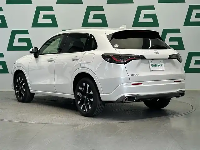 ホンダ ＺＲ－Ｖ Z 鹿児島県 2024(令6)年 2.1万km プラチナホワイトパール 禁煙車/純正9インチナビ(フルセグTV/Bluetooth)/全方位カメラ/ホンダセンシング/追従型クルーズコントロール/BOSEプレミアムサウンド/ブラインドスポットインフォメーション/後退出庫サポート/アダプティブドライビングビーム/運転席メモリー機能付きパワーシート/前席シートヒーター/前方ドライブレコーダー/ステアリングヒーター/本革シート/パワーバックドア/ワイヤレス充電/ETC/純正フロアマット/純正アルミホイール/LEDヘッドライト