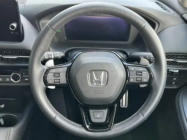 ホンダ ＺＲ－Ｖ Z 鹿児島県 2024(令6)年 2.1万km プラチナホワイトパール 禁煙車/純正9インチナビ(フルセグTV/Bluetooth)/全方位カメラ/ホンダセンシング/追従型クルーズコントロール/BOSEプレミアムサウンド/ブラインドスポットインフォメーション/後退出庫サポート/アダプティブドライビングビーム/運転席メモリー機能付きパワーシート/前席シートヒーター/前方ドライブレコーダー/ステアリングヒーター/本革シート/パワーバックドア/ワイヤレス充電/ETC/純正フロアマット/純正アルミホイール/LEDヘッドライト