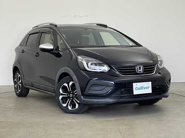 ホンダ フィット e:HEVクロスター 秋田県 2020(令2)年 4.9万km ミッドナイトブルービームM 4WD/純正SDナビ(CD DVD SD BT)/バックカメラ/ホンダセンシング/　・衝突軽減ブレーキ/　・誤発進抑制機能（前方・後方）/　・近距離衝突軽減ブレーキ（前方・後方）/　・路外逸脱抑制機能/　・歩行者事故低減ステアリング/　・車線維持支援システム/　・渋滞追従機能付きアダプティブクルーズコントロール/　・先行車発進お知らせ機能/　・標識認識機能/　・オートハイビーム/ETC/純正前後ドラレコ/コーナーセンサー/プッシュスタート/スマートキー/スペアキー/純正フロアマット/純正アルミホイール/LEDヘッドライト/ステアリングスイッチ/USBジャック