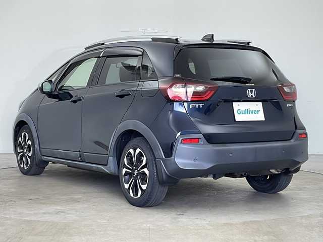ホンダ フィット e:HEVクロスター 秋田県 2020(令2)年 4.9万km ミッドナイトブルービームM 4WD/純正SDナビ(CD DVD SD BT)/バックカメラ/ホンダセンシング/　・衝突軽減ブレーキ/　・誤発進抑制機能（前方・後方）/　・近距離衝突軽減ブレーキ（前方・後方）/　・路外逸脱抑制機能/　・歩行者事故低減ステアリング/　・車線維持支援システム/　・渋滞追従機能付きアダプティブクルーズコントロール/　・先行車発進お知らせ機能/　・標識認識機能/　・オートハイビーム/ETC/純正前後ドラレコ/コーナーセンサー/プッシュスタート/スマートキー/スペアキー/純正フロアマット/純正アルミホイール/LEDヘッドライト/ステアリングスイッチ/USBジャック