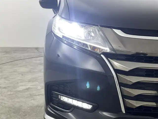 ホンダ オデッセイ アブソルート ホンダセンシング 大阪府 2020(令2)年 5万km プレミアムスパークルブラックパール ホンダセンシング　/・CMBS/・車線逸脱警報/・レーダークルーズコントロール/・レーンアシスト/純正ナビゲーション/【AM/FM/Bluetooth/フルセグ】　/バックカメラ　/純正フリップダウンモニター　/ハーフレザーシート　/パワーシート　/両側パワースライドドア　/ＥＴＣ２．０　/プッシュスタート　/・スマートキー　/LEDライト　/・オートライト/・フォグライト/純正フロアマット