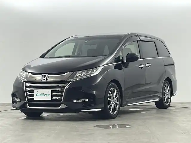 ホンダ オデッセイ アブソルート ホンダセンシング 大阪府 2020(令2)年 5万km プレミアムスパークルブラックパール ホンダセンシング　/・CMBS/・車線逸脱警報/・レーダークルーズコントロール/・レーンアシスト/純正ナビゲーション/【AM/FM/Bluetooth/フルセグ】　/バックカメラ　/純正フリップダウンモニター　/ハーフレザーシート　/パワーシート　/両側パワースライドドア　/ＥＴＣ２．０　/プッシュスタート　/・スマートキー　/LEDライト　/・オートライト/・フォグライト/純正フロアマット