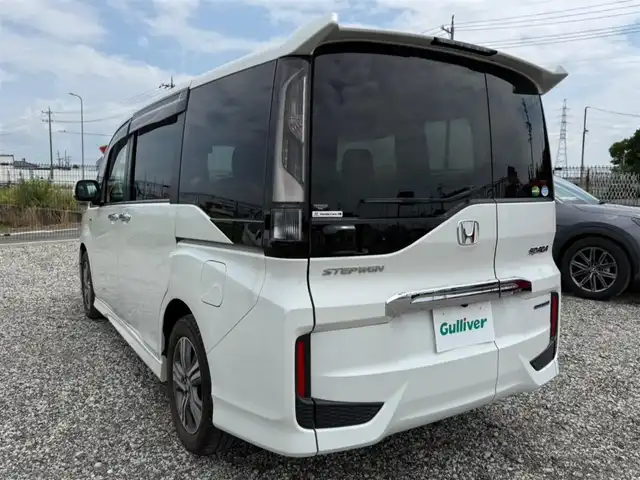 ホンダ ステップワゴン スパーダ ハイブリッド G EX ホンダセンシング 富山県 2018(平30)年 5.8万km プラチナホワイトパール 純正9型ナビ/　(Bluetooth/CD/DVD)/フルセグTV/両側パワースライドドア/バックモニター/ビルトインETC/純正ドライブレコーダー/渋滞追従機能付アダプティブクルコン/ホンダセンシング/・衝突軽減ブレーキ/・誤発進抑制機能/・車線維持支援システム/・標識認識機能/・先行車発進お知らせ機能/・歩行者事故低減ステアリング/LEDヘッドランプ/デュアルオートエアコン/本革巻きステアリング/ソフトウィーブ/合皮コンビシート/前席シートヒーター/2列目キャプテンシート/純正16インチアルミホイール/スマートキーシステム/禁煙車