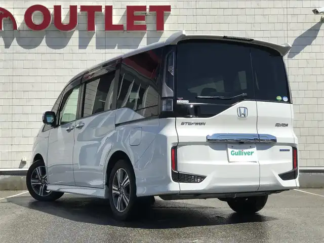 ホンダ ステップワゴン スパーダ ハイブリッド G EX ホンダセンシング 富山県 2018(平30)年 5.8万km プラチナホワイトパール 純正9型ナビ/　(Bluetooth/CD/DVD)/フルセグTV/両側パワースライドドア/バックモニター/ビルトインETC/純正ドライブレコーダー/渋滞追従機能付アダプティブクルコン/ホンダセンシング/・衝突軽減ブレーキ/・誤発進抑制機能/・車線維持支援システム/・標識認識機能/・先行車発進お知らせ機能/・歩行者事故低減ステアリング/LEDヘッドランプ/デュアルオートエアコン/本革巻きステアリング/ソフトウィーブ/合皮コンビシート/前席シートヒーター/2列目キャプテンシート/純正16インチアルミホイール/スマートキーシステム/禁煙車