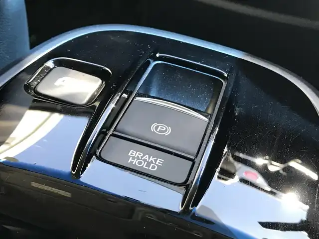 ホンダ ステップワゴン スパーダ ハイブリッド G EX ホンダセンシング 富山県 2018(平30)年 5.8万km プラチナホワイトパール 純正9型ナビ/　(Bluetooth/CD/DVD)/フルセグTV/両側パワースライドドア/バックモニター/ビルトインETC/純正ドライブレコーダー/渋滞追従機能付アダプティブクルコン/ホンダセンシング/・衝突軽減ブレーキ/・誤発進抑制機能/・車線維持支援システム/・標識認識機能/・先行車発進お知らせ機能/・歩行者事故低減ステアリング/LEDヘッドランプ/デュアルオートエアコン/本革巻きステアリング/ソフトウィーブ/合皮コンビシート/前席シートヒーター/2列目キャプテンシート/純正16インチアルミホイール/スマートキーシステム/禁煙車