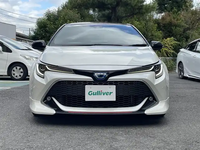 トヨタ カローラ スポーツ ハイブリッドG Z 静岡県 2020(令2)年 7.4万km アティチュードブラックマイカ/ホワイトパールクリスタルシャイン ワンオーナー/TRDエアロ/純正ナビ/フルセグTV/BT/バックカメラ/ハーフレザーシート/前席シートヒーター/前後ドライブレコーダー/ビルトインETC/プリクラッシュセーフティ/レーンキープアシスト/オートハイビーム/レーダークルーズコントロール/クリアランスソナー/ブラインドスポットモニター/LEDライト/LEDフォグ/スマートキー×2/保証書/取扱説明書/ナビ取扱説明書/R7点検記録簿有