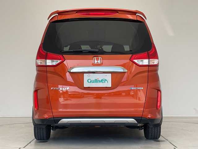 ホンダ フリード＋ ハイブリット クロスター ホンダセンシング 愛知県 2021(令3)年 3.4万km プレミアムクリスタルオレンジM 純正9型ナビ/フリップダウンモニター/両側パワースライドドア/レーダークルーズコントロール/シートヒーター/バックカメラ/コーナーセンサー/LEDヘッドライト/オートライト/ドライブレコーダー/ETC/衝突軽減システム/フルセグ/CD DVD/Bluetooth/ステアリングスイッチ/スマートキー/プッシュスタート