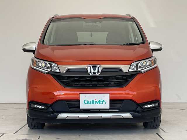 ホンダ フリード＋ ハイブリット クロスター ホンダセンシング 愛知県 2021(令3)年 3.4万km プレミアムクリスタルオレンジM 純正9型ナビ/フリップダウンモニター/両側パワースライドドア/レーダークルーズコントロール/シートヒーター/バックカメラ/コーナーセンサー/LEDヘッドライト/オートライト/ドライブレコーダー/ETC/衝突軽減システム/フルセグ/CD DVD/Bluetooth/ステアリングスイッチ/スマートキー/プッシュスタート
